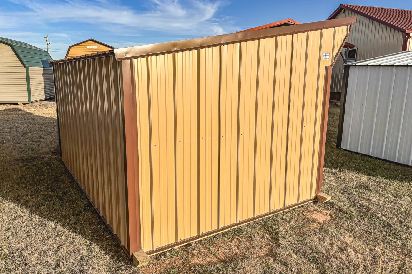 Loafing shed, tan and brown, side view