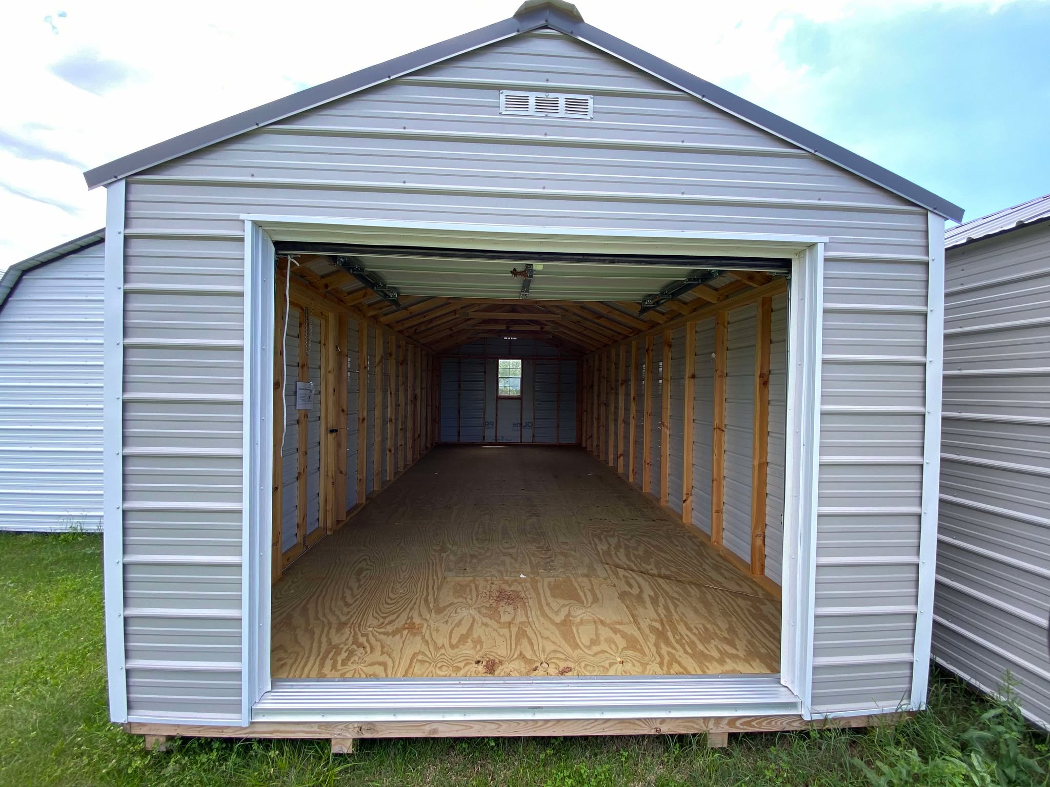 Metal Garage 12 x 28 with REAL garage door! photo 2