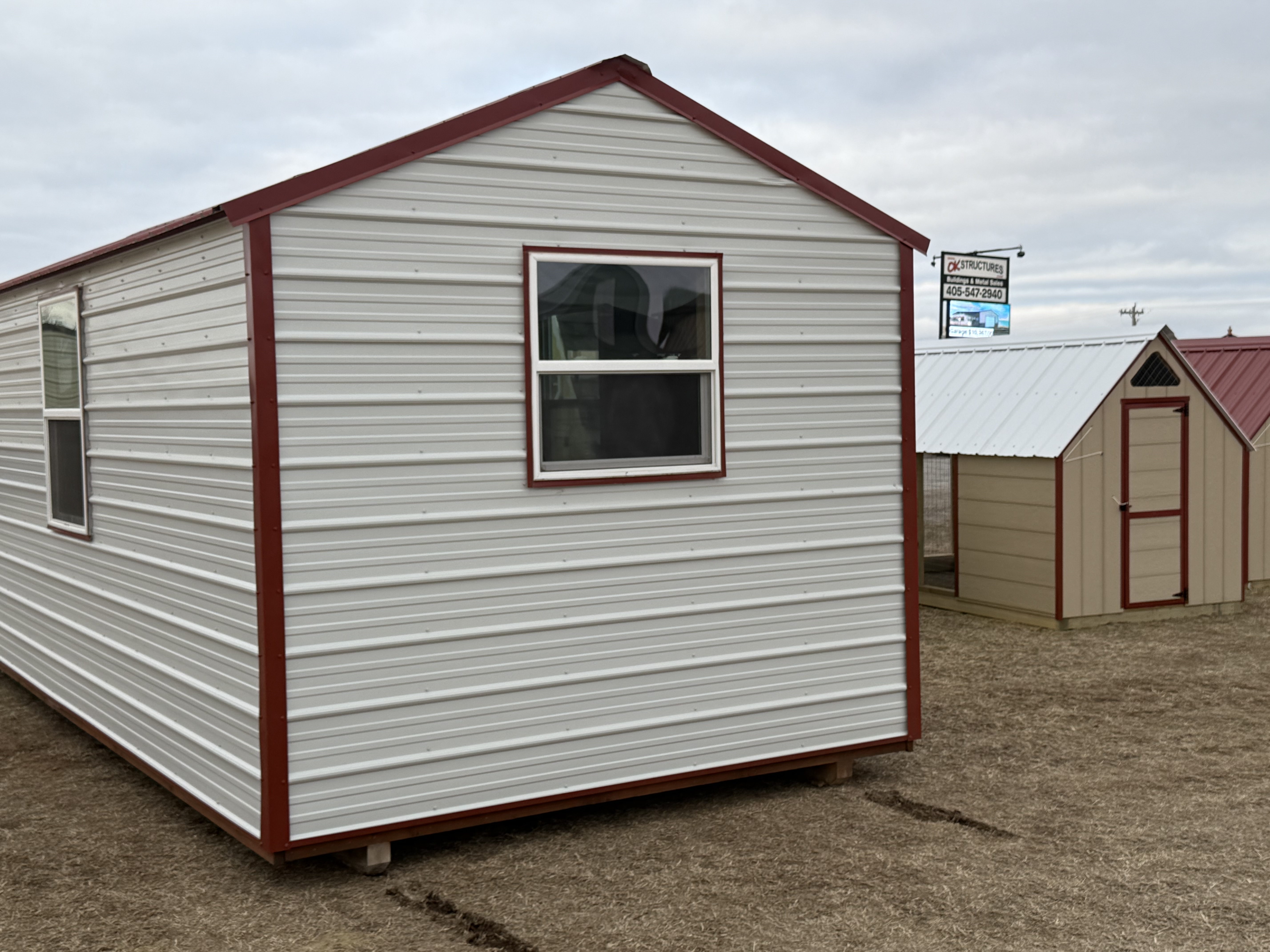ALERT DISPLAY MODEL! (not for sale) 10x24 Finished Studio w/Porch photo 3